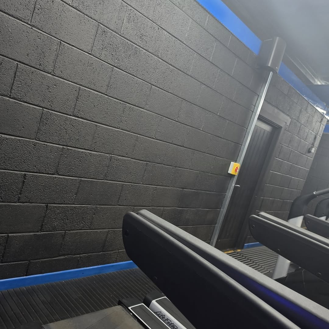 The same wall freshly painted black